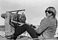 Bob McMillen poses with a whale harpoon cannon on the Sioux City, a former whaling ship, in Richmond CA circa February 1976.
