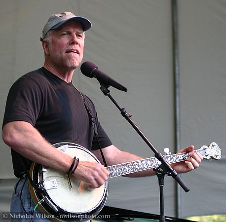 John McCutcheon sings and plays banjo on the main stage