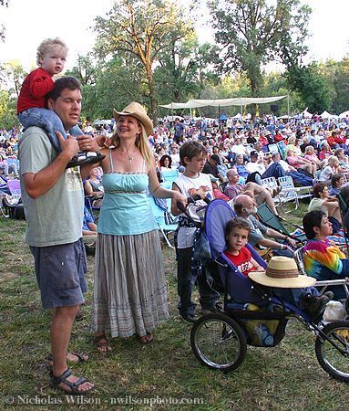 A young family enjoys the Kate Wolf Festival 2005 together.