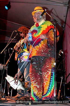 Wavy Gravy makes an announcement from the main stage Friday night.