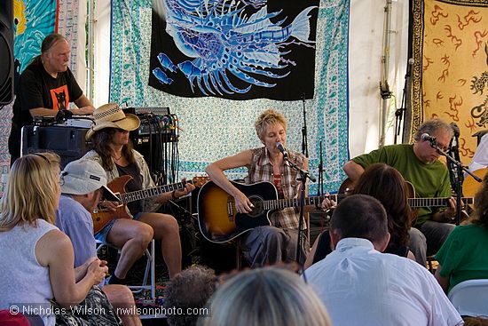 Eliza Gilkyson sings one at the Songwriter's Circle at the Revival Tent