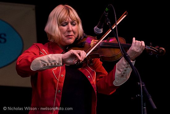 Barbara Lamb on fiddle with Laura Love Band