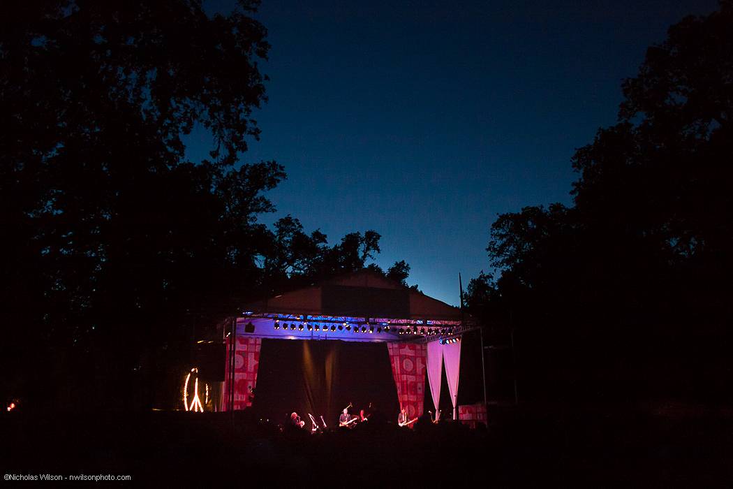 The Main stage against a twilight sky at 9:30 PM Saturday night.