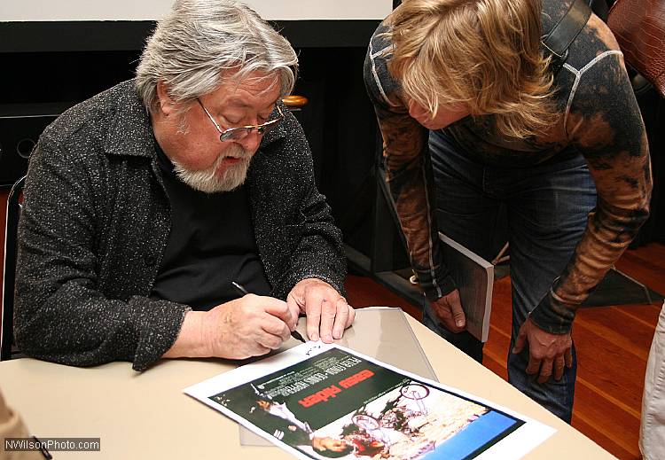 Cinematographer Lszl Kovcs autographs an "Easy Rider" movie poster at the inaugural Mendocino Film Festival in 2006.