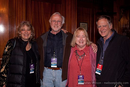 Wendy Slick ("Passion and Power"), Bob Elfstrom ("Winner
        of Albert Maysles Award"), Program Director Pat Ferrero, and Alan
        Dater ("Taking Root") at the Mendocino Film Festival Opening
        Party.
