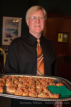 Bob Winegar offers hors d'oeuvres