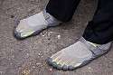 Danny Glover sports unusual footwear by Vibram.