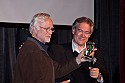 Filmmaker Robert Elfstrom received the Albert Maysles Award for Excellence in Documentary Filmmaking from Jim McCullough