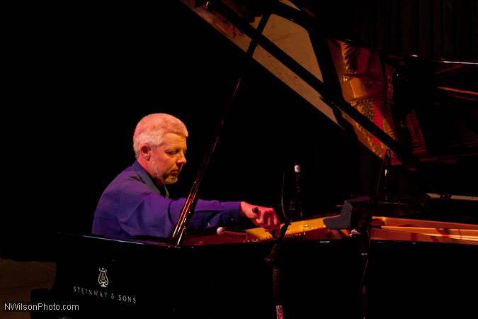Mendocino Music Festival piano tecnician Ted Kidwell tunes the piano for Julian Pollack.