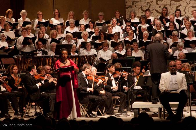 The Mendocino Music Festival Orchestra and Chorus in the final concert. Soprano soloist Shawnette Sulker standing.