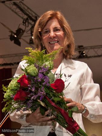 MMF choral director Carolyn Steinbuck with bouquet after the closing concert.