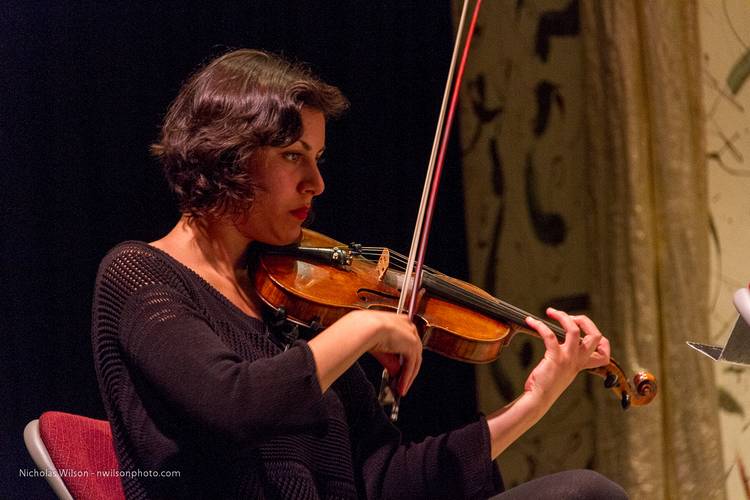 Emerging artist Ana Vafai, graduate student in music at SUNY Buffalo, on violin with the Chamber Orchestra.