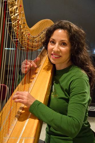 Harpist Anna Maria Mendieta in rehearsal