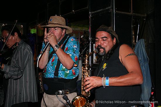 Gino Jacomella on blues harp and Oscar Fuentes on sax jamming with Philo Hayward at the Shuffle Band reunion party at Caspar in 8/10/2007. In left background is Butch Kwan on fiddle.